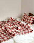 Refined Plaid Faux Lambswool Throw Blanket with Pom-Poms – Cozy & Stylish Home Décor