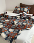Refined Plaid Faux Lambswool Throw Blanket with Pom-Poms – Cozy & Stylish Home Décor