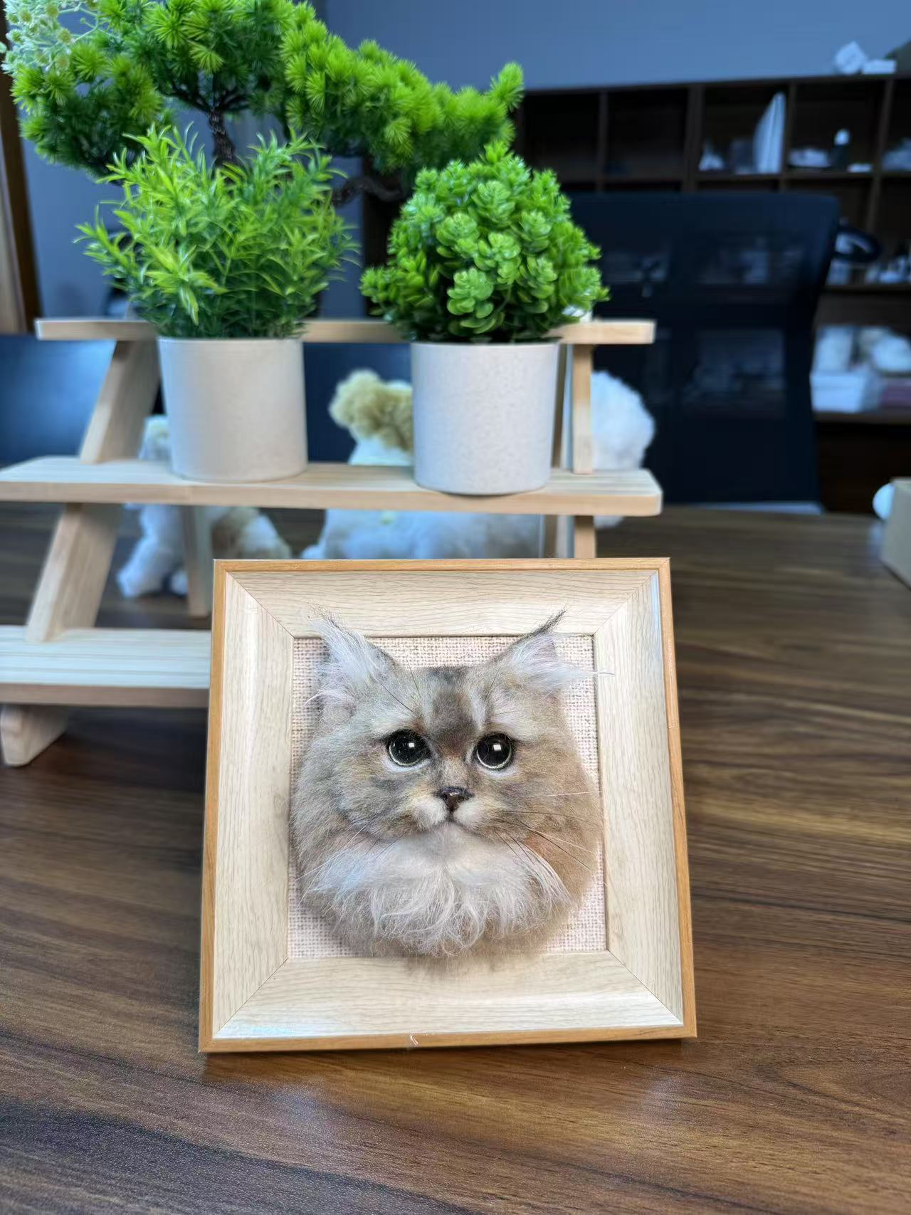 Framed handmade wool felt cat portrait showing soft fur detail